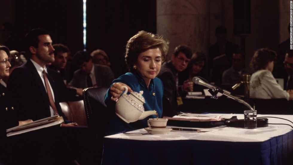 Clinton pours herself a cup of tea in 1993 while testifying to the Senate Education and Labor Committee about health care reform.