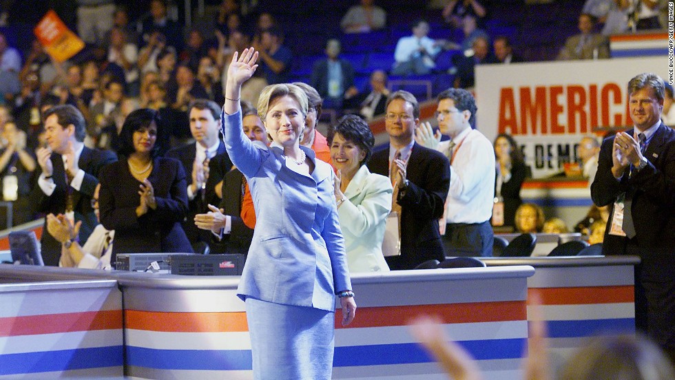 Clinton waves to the crowd as she arrives on the stage at the Democratic National Convention on August 14, 2000, in Los Angeles.