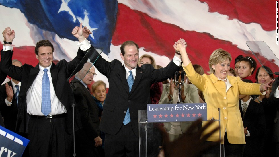 Andrew Cuomo, Eliot Spitzer and Clinton celebrate
with a crowd of Democratic supporters after their wins in various races
November 7, 2006, in New York.