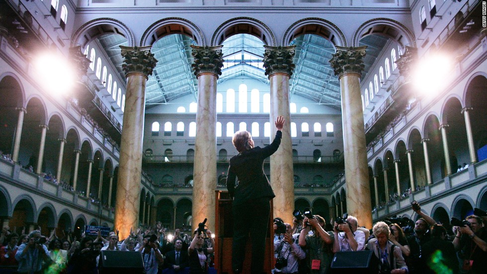 Clinton waves as she speaks to supporters at the National Building
Museum on June 7, 2008, in Washington. After pulling out of the
presidential race, Clinton thanked her supporters and urged them to back
Barack Obama to be the next president of the United States.