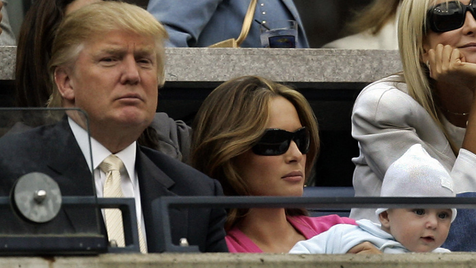 Trump attends the U.S. Open tennis tournament with his third wife, Melania Knauss-Trump, and their son, Barron William Trump, in 2006. Trump and Knauss married in 2005. Trump has five children from three marriages.