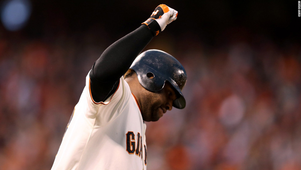 Pablo Sandoval of the San Francisco Giants rounds the bases after hitting a two-run home run to left field against Justin Verlander of the Detroit Tigers in the third inning.