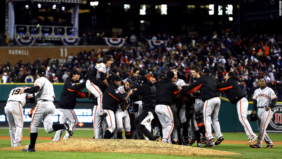 The San Francisco Giants celebrate after the team beat the Detroit Tigers in 10 innings to win the World Series on Sunday, October 28, at Comerica Park in Detroit. The Giants defeated the Tigers 4-3 to sweep the series in four games. <a href="http://www.cnn.com/2012/10/27/worldsport/gallery/world-series-game-3/index.html">See the best photos of Game 3 here</a>.
