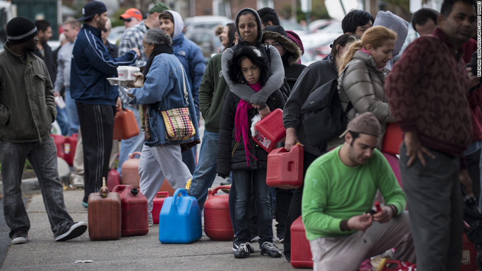 People wait in line for fuel at a Shell Oil station onThursday in Fort Lee, New Jersey. Fuel shortages have led to long lines of cars at gasoline stations in many states.