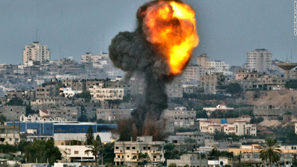 Smokes billows from a target of an Israeli airstrike Friday, November 16, in Gaza near the border with Israel.