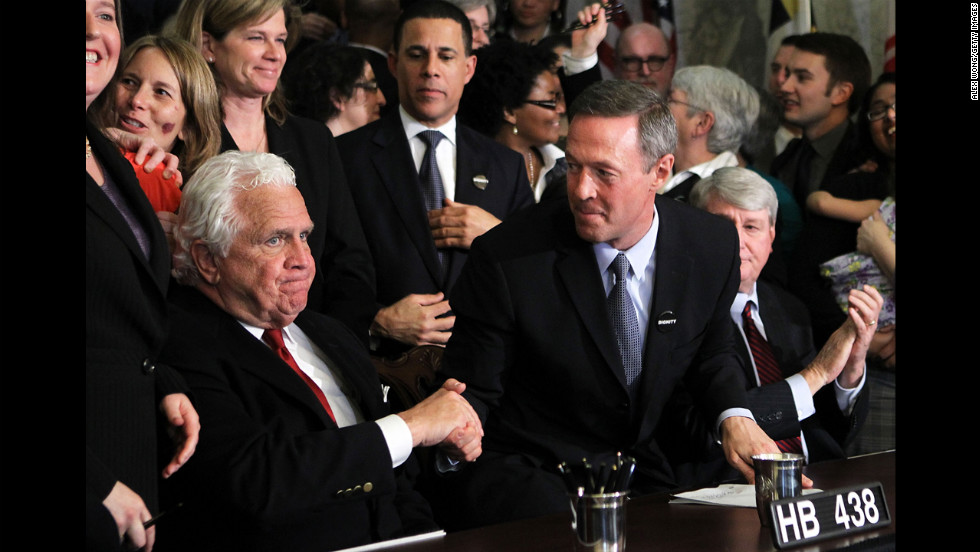 Maryland Gov. Martin O&#39;Malley, center, shakes hands with Senate President Thomas V. &quot;Mike&quot; Miller after signing a same-sex marriage bill in March 2012. The law was challenged, but voters approved marriage equality in a November 2012 referendum.