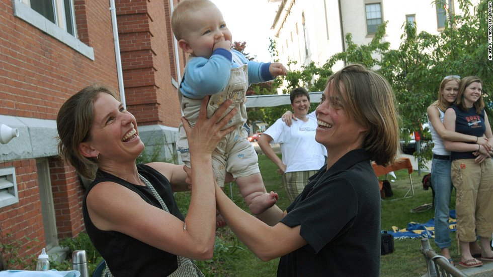 Lara Ramsey, left, and her partner of eight years, Jane Lohmann, play with their 7-month-old son, Wyatt Ramsey-Lohmann. The two wed in 2004 after Massachusetts approved same-sex marriage. Massachusetts was the first state to do so.