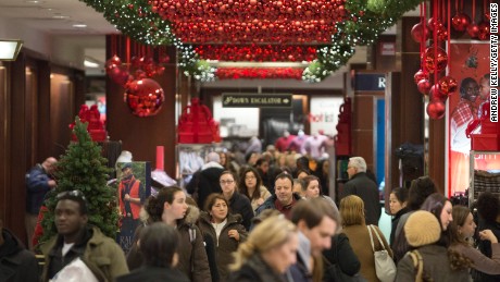 Shoppers fill Macy's during the Black Friday sales on November 23, 2012 in New York City. Black Friday, the official start of the holiday shopping season and busiest shopping day of the year for many retailers got it's name as it's said to put retailers 'in the black'. (Photo by Andrew Kelly/Getty Images) 