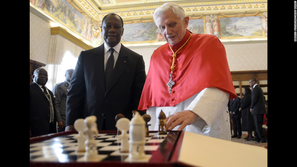 Benedict looks at a chess game with Ivory Coast President Alassane Ouattara during a private audience in November 2012 at the Vatican.