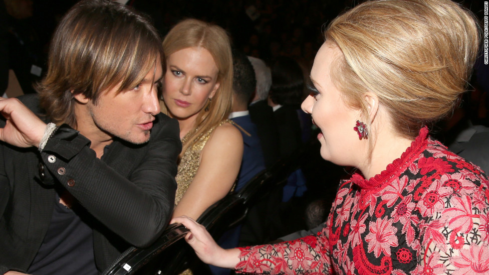 Keith Urban to Adele: "You're telling me you just blast your 'do with this hairpray on Mondays, and it stays put all week? See, that's what I need!"<br />Nicole Kidman to herself: "Please, God. No."