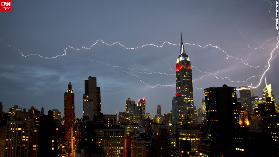 <a href="http://ireport.cnn.com/docs/DOC-821097">Matthew Burke</a> shot this dramatic lightning strike from his Manhattan apartment window. "The brunt of the storm itself was intense but short," he said. "There was very strong rain and wind for about 15 minutes, at which point the rain cleared and the lightning show began."