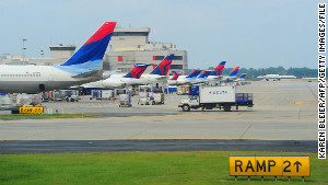 Delta Airlines jets at the terminal at Hartsfield-Jackson Atlanta International Airport in Atlanta, Georgeia on September 12, 2009. AFP PHOTO/Karen BLEIER (Photo credit should read KAREN BLEIER/AFP/Getty Images) 