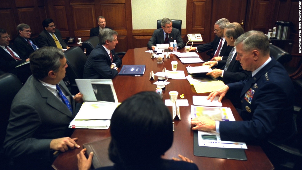 President George W. Bush meets with his war council in the Situation Room of the White House on March 21, 2003. Clockwise from foreground: National Security Adviser Condoleezza Rice, CIA Director George Tenet, Chief of Staff Andy Card, Secretary of State Colin Powell, Secretary of Defense Donald Rumsfeld and Chairman of the Joint Chiefs of Staff Gen. Richard Myers were present.