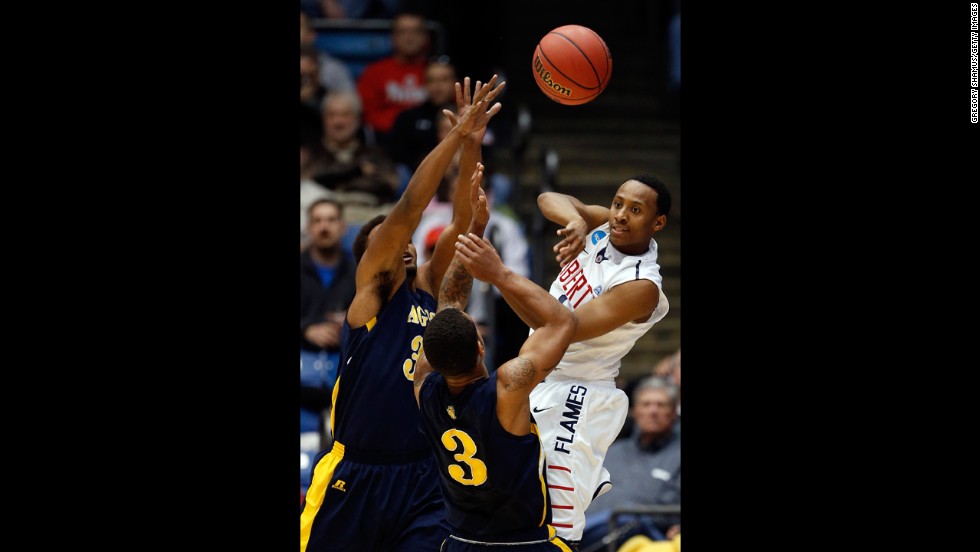 Davon Marshall of Liberty passes the ball during the first half against N.C. A&T on March 19.