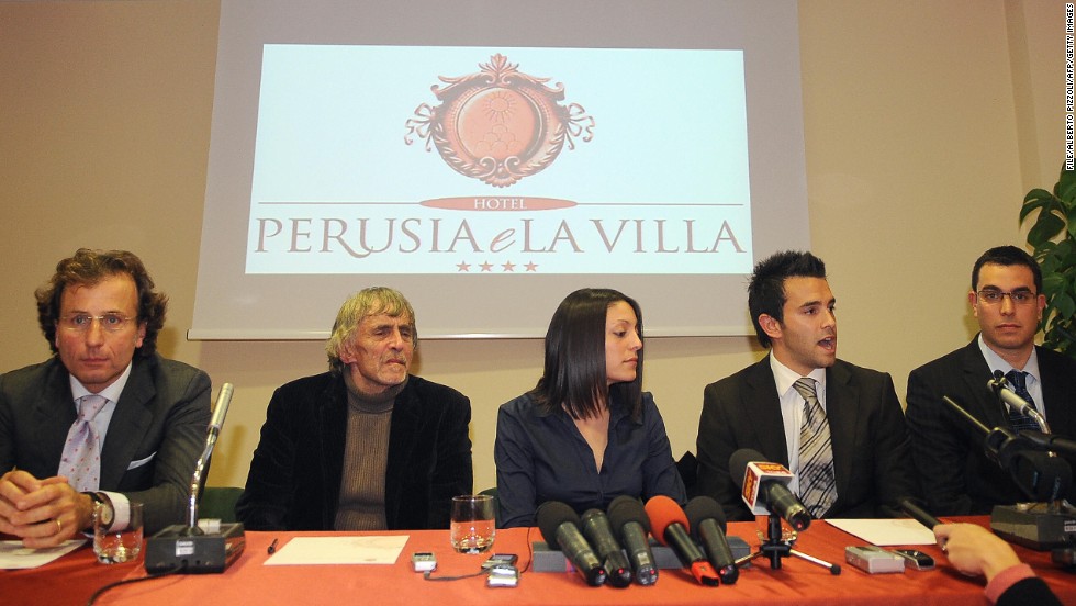 Meredith Kercher's family lawyer Francesco Maresca, left, argued in court in 2011 that the multiple stab wounds implied more than one aggressor killed Kercher. Pictured from left are Maresca, Kercher's father John, sister Stephanie, brother Lyle and brother John at a press conference in 2008.