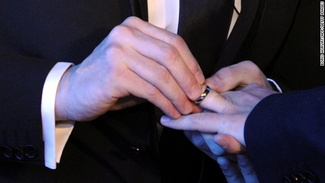 gay couple wedding rings