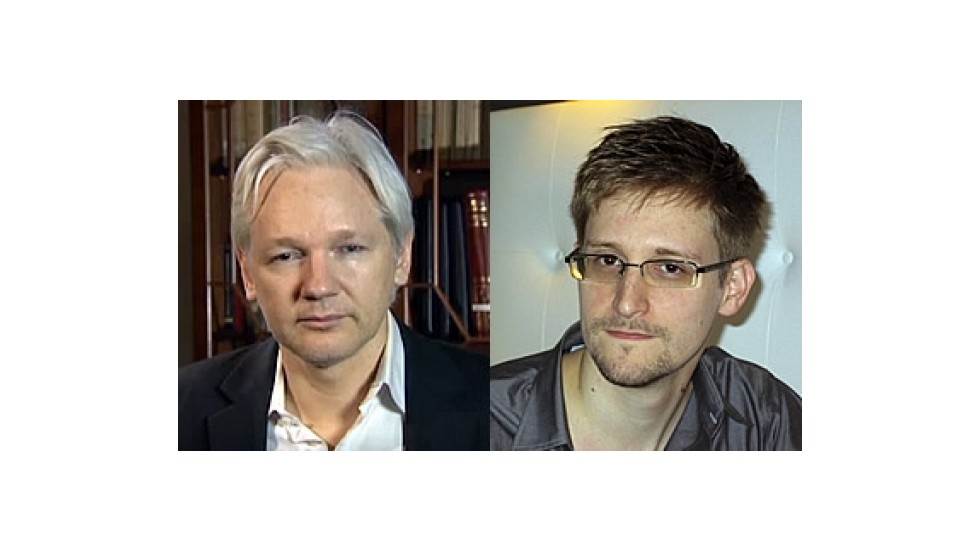 France&#39;s justice minister discussed possible asylum for WikiLeaks&#39; Julian Assange (left) and former contractor Edward Snowden.