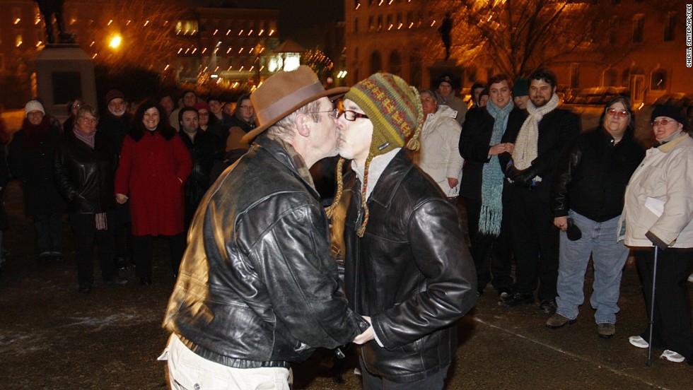 Olin Burkhart, left, and Carl Burkhart kiss on the steps of the New Hampshire Capitol in January 2010 after the state&#39;s law allowing same-sex marriage went into effect.