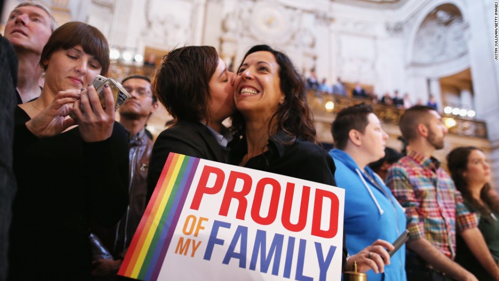 A couple celebrates at San Francisco City Hall upon hearing about the U.S. Supreme Court rulings on same-sex marriage in June 2013. The high court cleared the way for same-sex couples in California to resume marrying after dismissing an appeal on Proposition 8 on jurisdictional grounds. The court also struck down a key part of the Defense of Marriage Act, a 1996 federal law defining marriage as between a man and a woman. 