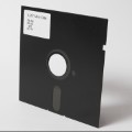 It may be labelled "Mini-Disk" but no this is not a shot of the much-loved but shortlived early 90s MiniDisc. This is a compact version of the first ever 8 inch floppy disk (circa 197x), which was nominated by none other than the man who lays claim to its invention, Dr xxxx Nakatsuma.