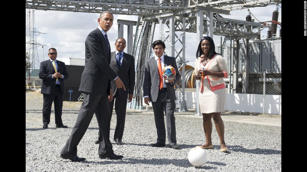 President Barack Obama kicks around an energy-generating soccer ball at a power plant in Dar es Salaam, Tanzania, on Tuesday, July 2. Obama was pushing for partnerships in energy as he concluded a three-nation trip to Africa. Tanzanian President Jakaya Kikwete, third from right, joined Obama at the Symbion Power Plant at Ubungo.