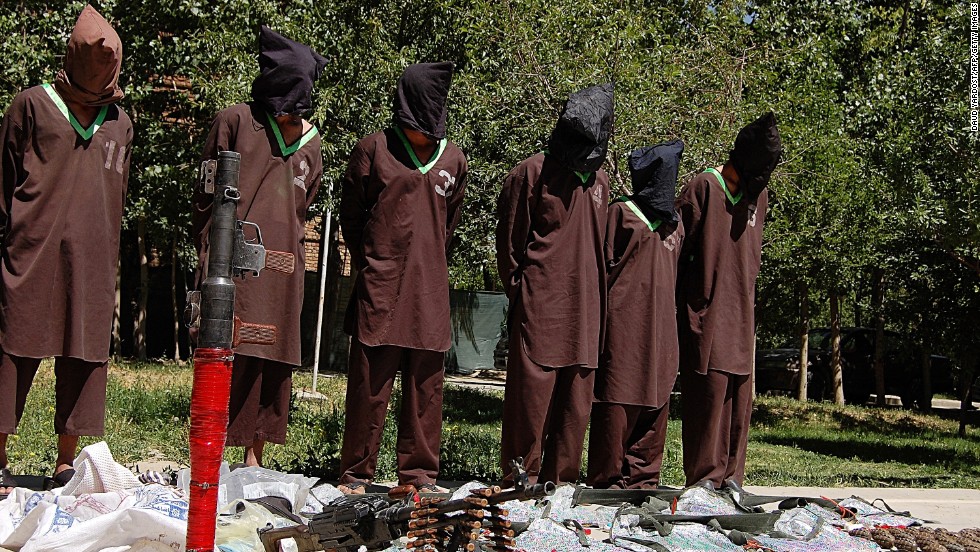Insurgents suspected of being from the Haqqani network are presented to the media at the Afghan National Directorate of Security (NDS) headquarters in Kabul on May 30, 2013. 
