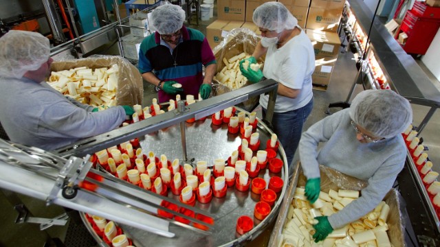 SANFORD, ME - MARCH 28:  Tom's of Maine employees work on the deodorant assembly line in the manufacturing plant March 28, 2006 in Sanford, Maine. The Colgate-Palmolive Company announced recently that it's buying Tom's of Maine, the leading maker of "natural" toothpaste. The U.S. market for Natural oral and personal care products is valued at $3 billion and is growing at 15 percent per year.  (Photo by Joe Raedle/Getty Images)