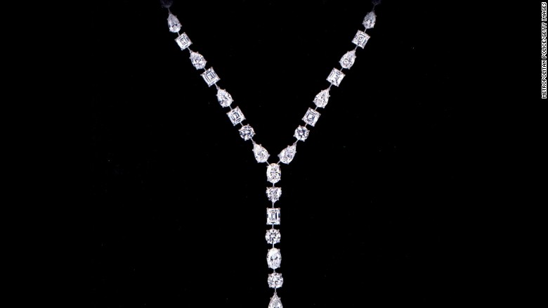 Wearing suits and in professional disguise makeup, two men stole 43 items worth $65 million in the middle of the day from Graff Jewelry Store in London in 2009. They threatened employees with handguns while collecting the merchandise, then drove off in a BMW. The two men were later arrested and jailed. Among the stolen items was this platinum diamond pendant hat.