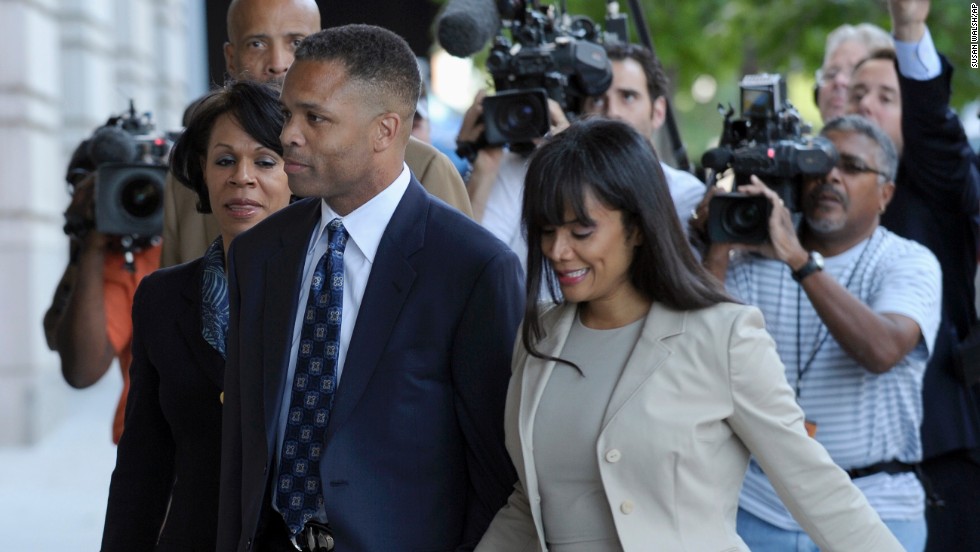 Former U.S. Rep. Jesse Jackson Jr., D-Illinois, and his wife, Sandra, arrive at federal court in Washington for sentencing in August 2013. Jackson was sentenced to 30 months in prison for improper use of campaign funds, while his wife got 12 months for filing false tax returns.