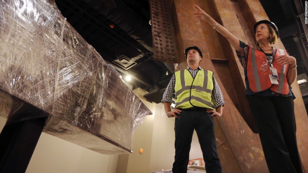 9/11 Memorial President Joe Daniels, left, and Museum Director Alice Greenwald speak during a tour. Several large artifacts from the original World Trade Center have been installed in the museum.