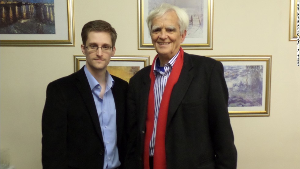 National Security Agency leaker Edward Snowden poses with German Green party parliamentarian Hans-Christian Stroebele in Moscow on October 31. Stroebele returned from the meeting with a letter from Snowden to German authorities, which was distributed to the media. In it, Snowden said he is confident that with international support, the United States would abandon its efforts to &quot;treat dissent as defection&quot; and &quot;criminalize political speech with felony charges.&quot;