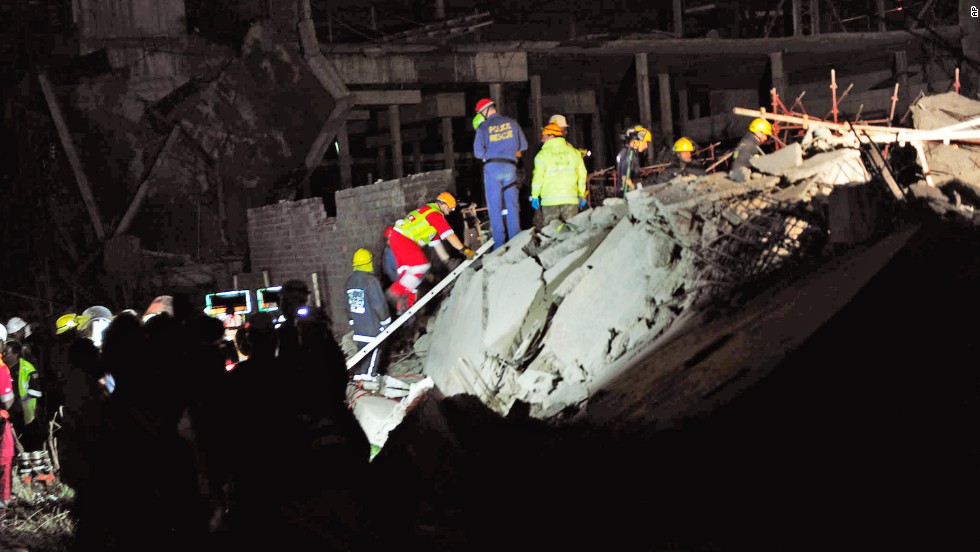 2 dead, 40 feared trapped in South Africa building collapse