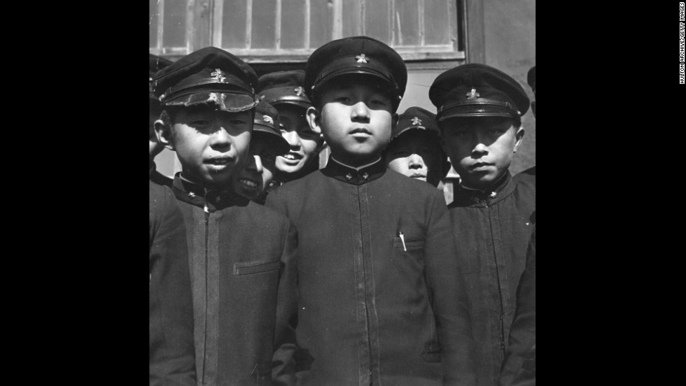 Crown Prince Akihito with some of his school friends at the Imperial School in Tokyo, circa 1938.   