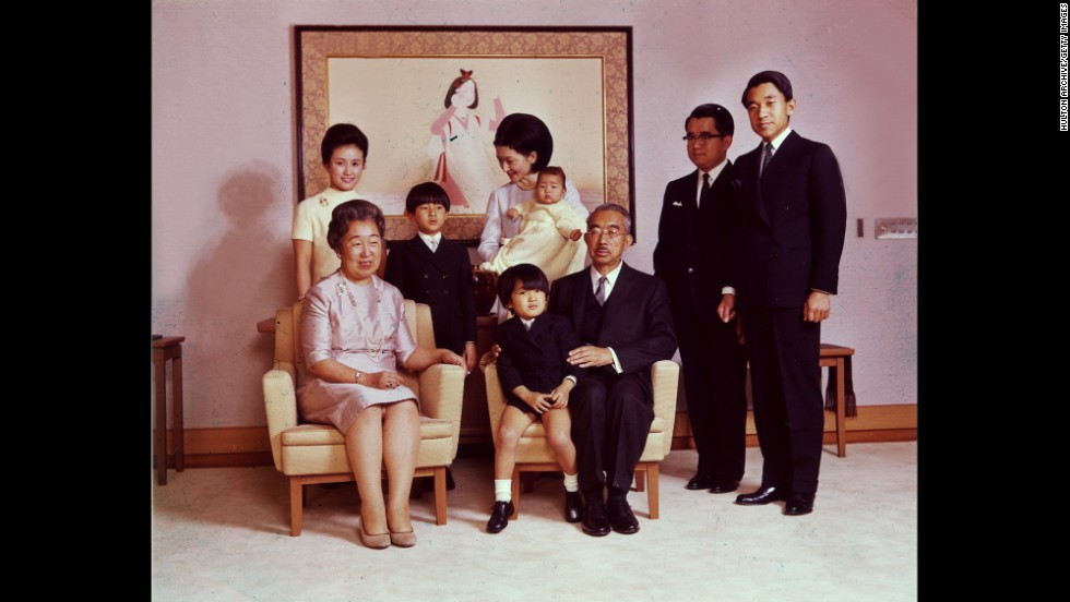 In a 1969 portrait, Emperor Hirohito and Empress Nagako pose with their children and grandchildren. Crown Prince Akihito stands on the far right. 