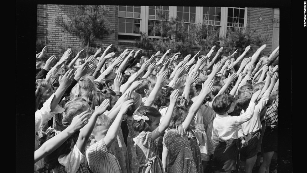 Southington, Connecticut school children pledge their allegiance to the flag, in May 1942.