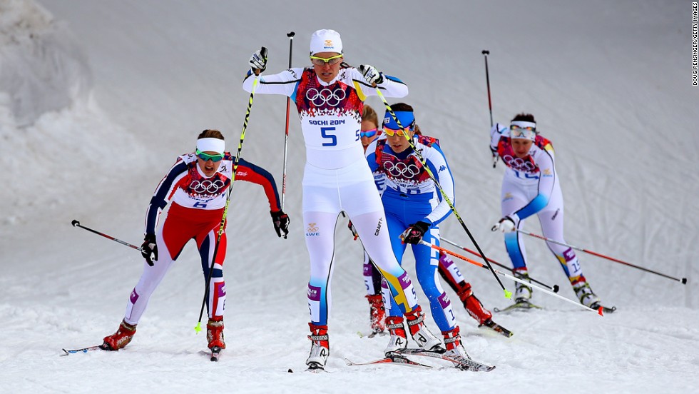 Ida Ingemarsdotter of Sweden leads a pack of skiers in the women's cross-country sprint on February 11.