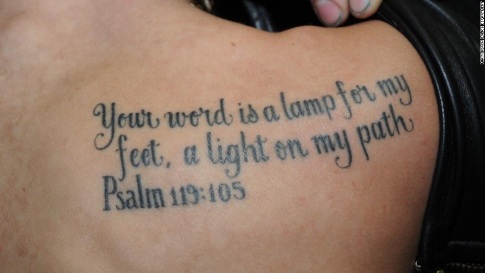 He sports a Bible verse, Psalm 119:105, that reads: &quot;Your word is a lamp for my feet, a light on my path&quot; on his other shoulder blade.