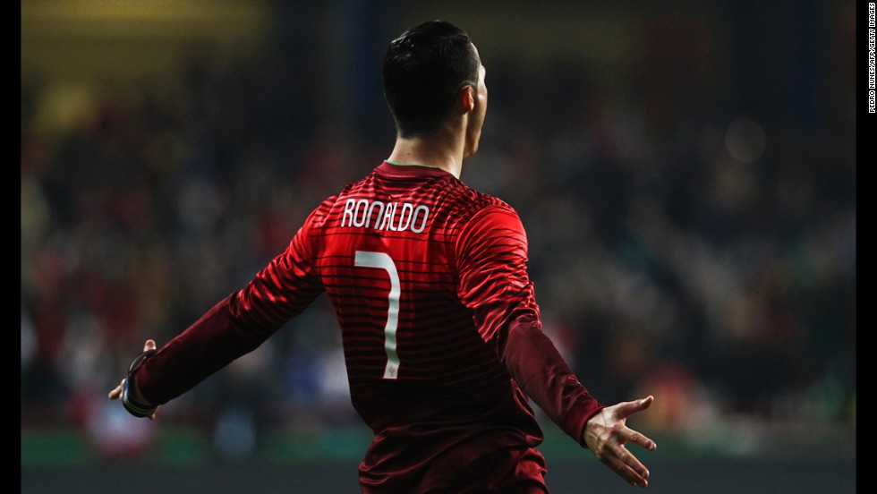 Portugal's Cristiano Ronaldo celebrates after scoring against Cameroon during a soccer match Wednesday, March 5, in Leiria, Portugal.