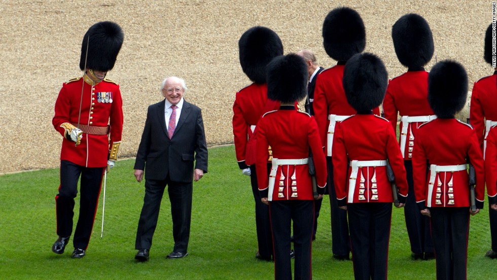 Irish President Michael D. Higgins inspects a guard of honor at Windsor Castle, west of London, on Tuesday, April 8. Higgins is the first Irish head of state to make a <a href="http://www.cnn.com/2014/04/09/europe/gallery/irish-president-state-visit-britain/index.html">state visit</a> to the United Kingdom. <a href="http://www.cnn.com/2014/04/04/world/gallery/week-in-photos-0403/index.html">See last week in 33 photos</a>