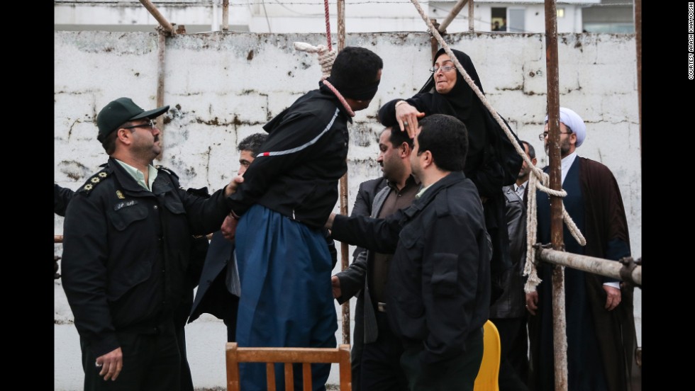 Maryam Hosseinzadeh, standing on a chair, slaps Balal.