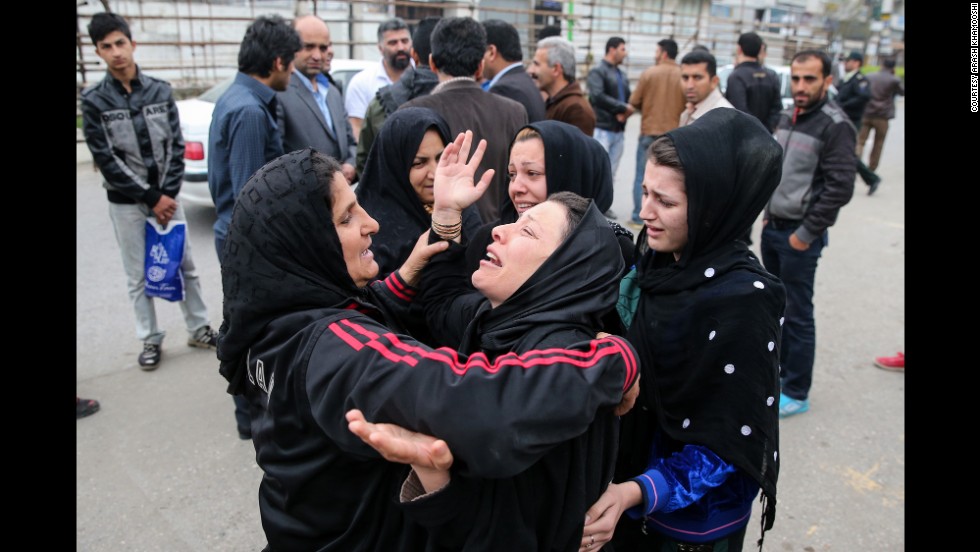 Balal&#39;s family embraces after the execution was halted.