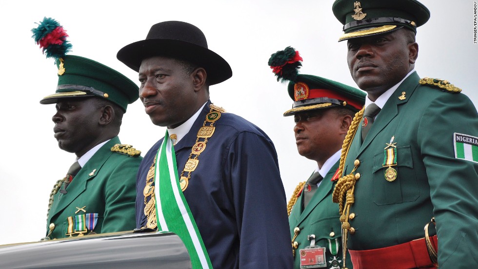 Nigerian President Goodluck Jonathan, second from left, stands on the back of a vehicle after being <a href="http://www.cnn.com/2011/WORLD/africa/05/29/nigeria.president.inauguration/index.html">sworn-in as President </a>during a ceremony in the capital of Abuja on May 29, 2011. In December 2011, Jonathan declared a <a href="http://www.cnn.com/2011/12/31/world/africa/nigeria-state-of-emergency/">state of emergency</a> in parts of the country afflicted by violence from Boko Haram.