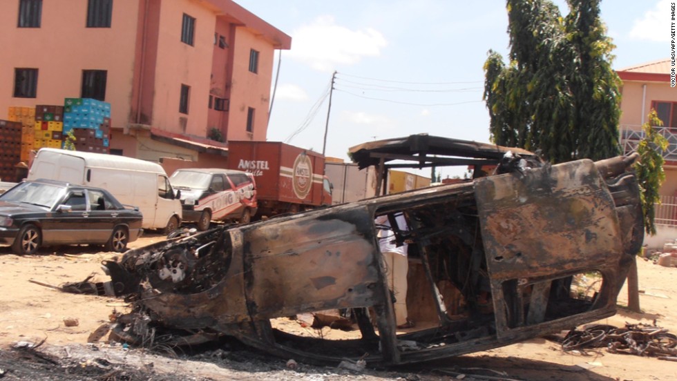A photo taken on June 18, 2012, shows a car vandalized after three church bombings and retaliatory attacks in northern Nigeria killed at least 50 people and injured more than 130 others, the Nigerian Red Cross Society said.