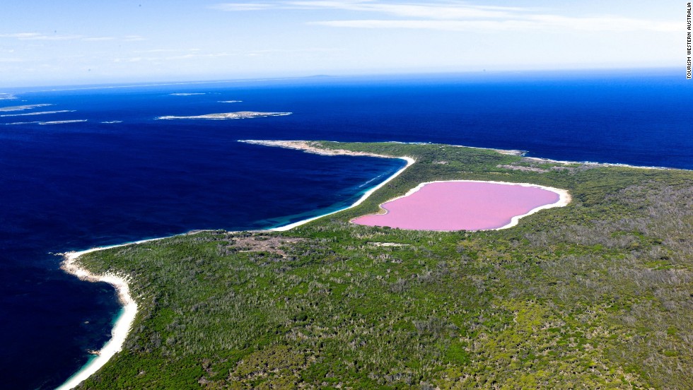 Bubblegum-pink Lake Hillier is a nearly 2,000-foot-wide lake on Middle Island, the largest of the Recherche island chain in the state of Western Australia. The remote lake is accessible via plane or boat excursion from nearby Esperance. The cause of the Lake Hillier's color isn't fully known. A high level of salinity and dye-producing bacteria are possible sources of the distinctive hue.