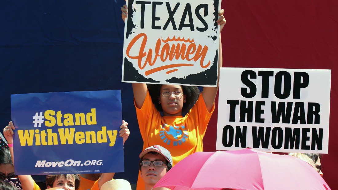 AUSTIN, TX - JULY 01: Supporters of Texas women's right to reproductive decisions rally at the Texas State capitol on July 1, 2013 in Austin, Texas. This is first day of a second legislative special session called by Texas Gov. Rick Perry to pass an restrictive abortion law through the Texas legislature. The first attempt was defeated after opponents of the law were able to stall the vote until after first special session had ended. (Photo by Erich Schlegel/Getty Images)