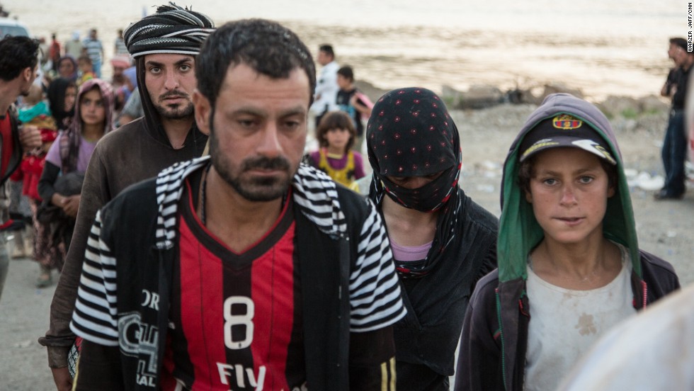 Yazidis fled into the barren and windswept Sinjar Mountains more than a week ago after ISIS captured their town.