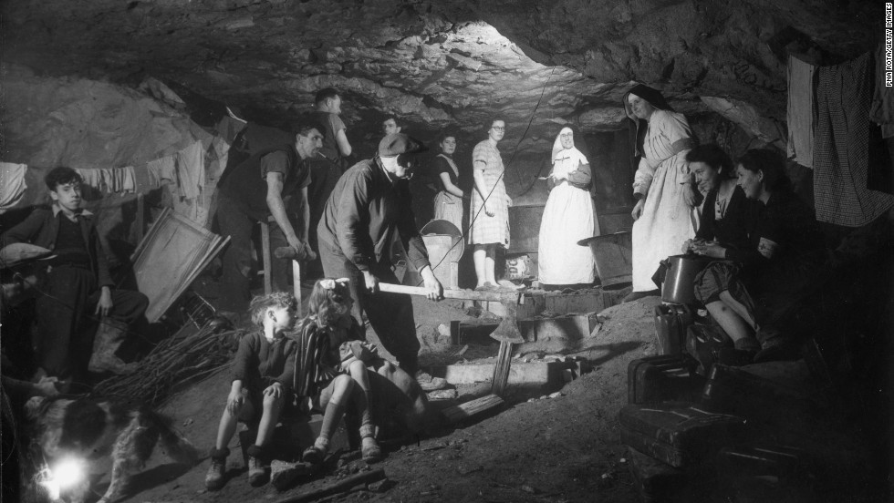 French refugees live in a quarry near Fleury sur Orne. During the bombing in that area, 20,000 refugees lived in the quarries. 