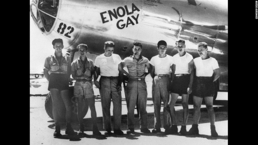 Col. Paul W. Tibbets Jr., center, stands with the ground crew of the B-29 bomber &quot;Enola Gay,&quot; which Tibbets piloted on August 6, 1945. The atomic bomb dropped on Hiroshima, Japan, that day killed an estimated 130,000 people. 