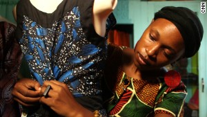 Botswanan fashion entrepreneur Kemi Kalikawe sells clothes and home furnishings from a store in Dar Es Salaam, Tanzania