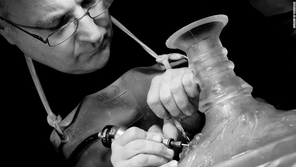 A Lalique master craftsman working on The Macallan 64 year old, auctioned for $460,000